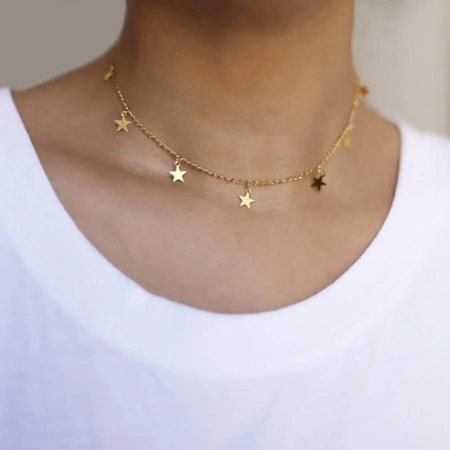 Gold choker store necklace with stars